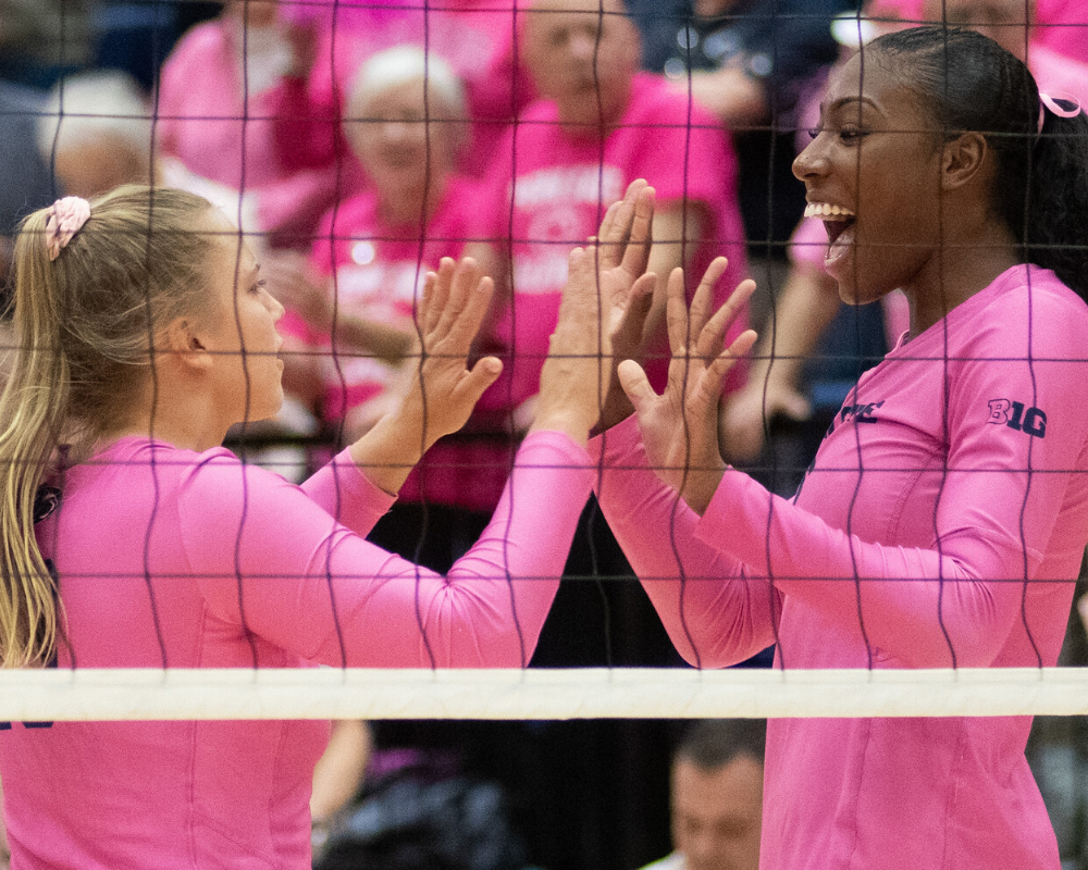 Volleyball Players at the Net