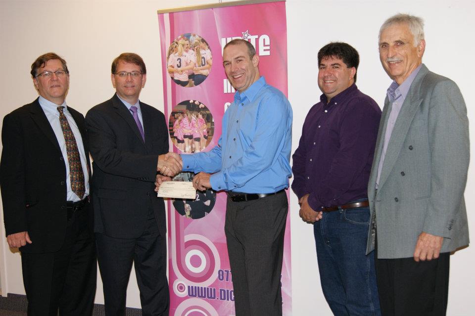 310358_10150347584609374_312870224373_7906777_830289781_n Rick Dunetz presents the check to FNIH (from left to right: David Wholley (director, The Biomarkers Consortium, FNIH), Dr. Scott Campbell (executive director and CEO, FNIH), Rick Dunetz (founder and executive director, Side-Out), Dr. Emanuel (Chip) Petricoin (co-director, GMU Center for Applied Proteomics and Molecular Medicine) and Bryant Dunetz (Rick's dad and COO, Side-Out))