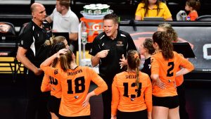 Oregon State Head Volleyball Coach in Team Huddle