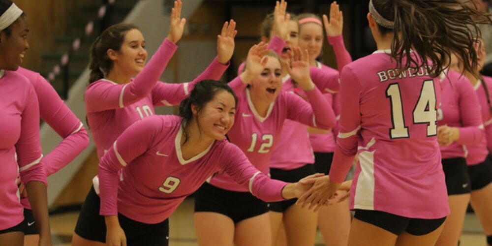 Megan's volleyball team pepping each other
