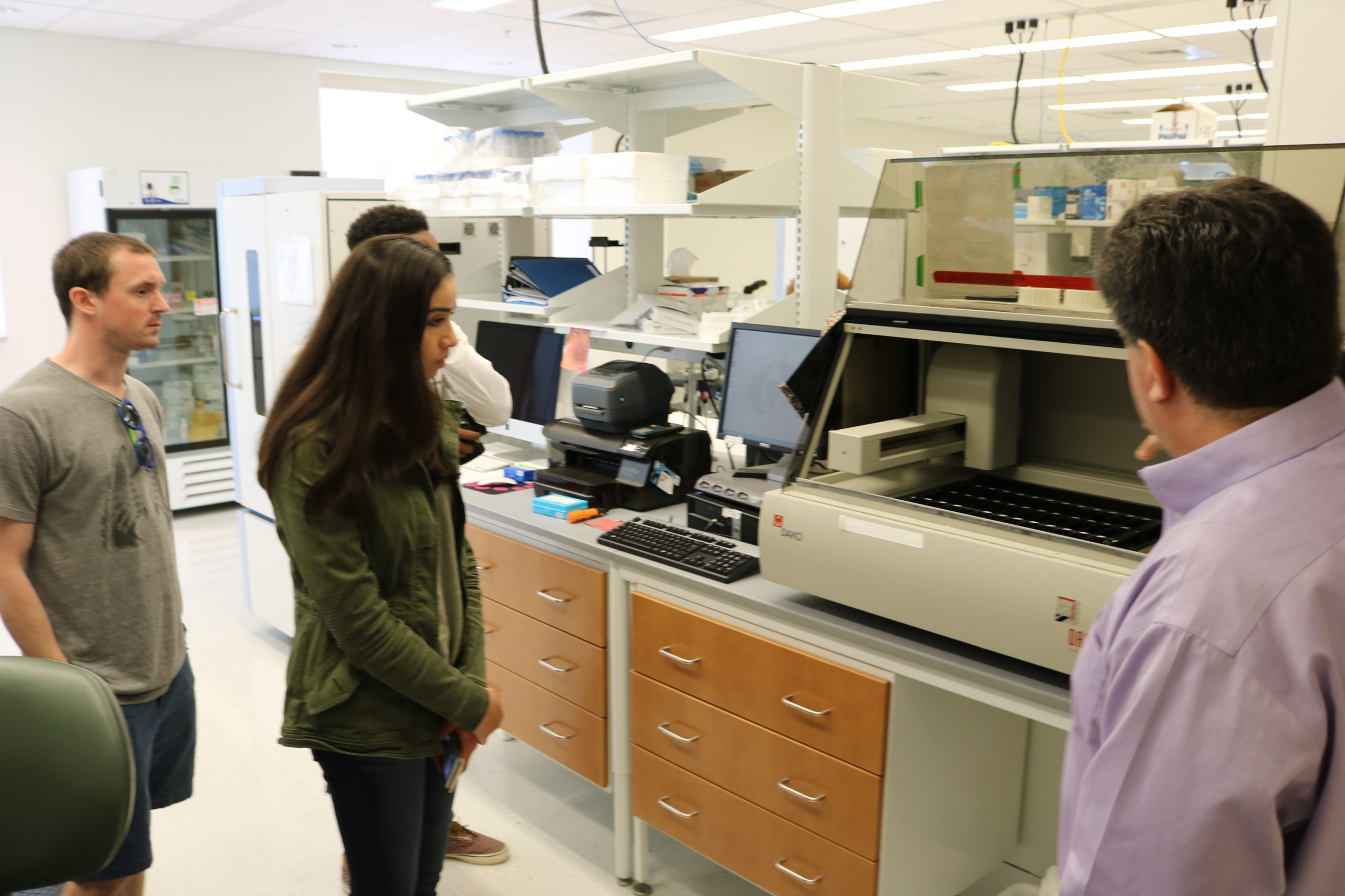 Kayla and the Side-Out staff visit the research site.